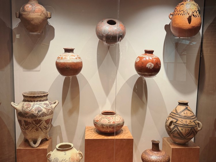Pre-Columbian ceramic vessels displayed inside Museo Nacional de Antropología in Mexico City.